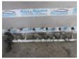 rampa injectoare bmw x5 3.0d 0445216002